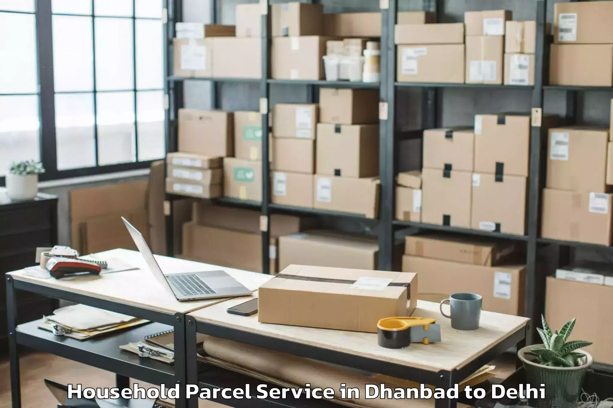 Book Dhanbad to Seema Puri Household Parcel